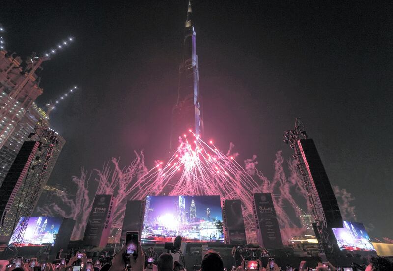 Dubai, United Arab Emirates - October 20, 2019: Fireworks go off at the One year to go celebrations. Sunday the 20th of October 2019. Burj Park, Dubai. Chris Whiteoak / The National