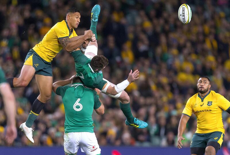 Rugby Union - June Internationals - Australia vs Ireland - Sydney Football Stadium, Sydney, Australia - June 23, 2018 - Israel Folau of Australia jumps for the ball with Peter O'Mahony of Ireland.      AAP/Craig Golding/via REUTERS    ATTENTION EDITORS - THIS IMAGE WAS PROVIDED BY A THIRD PARTY. NO RESALES. NO ARCHIVE. AUSTRALIA OUT. NEW ZEALAND OUT.