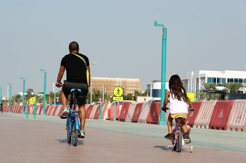 A bike ride along Sunset Beach, Dubai. Pawan Singh / The National