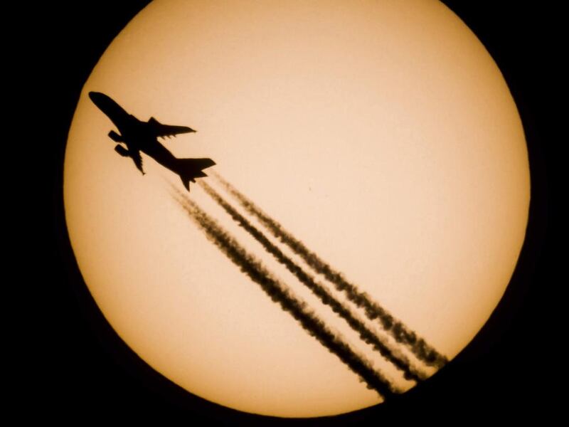 An Singapore Airlines passenger jet of Singapore Airlines is silhouetted against the Sun on October 28, 2016, in Salgotarjan, 109 kilometres north-east of Budapest, Hungary. Peter Komka / EPA