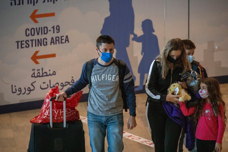 Travellers arrive at Ben Gurion Airport near Tel Aviv, Israel, on November 28. AP