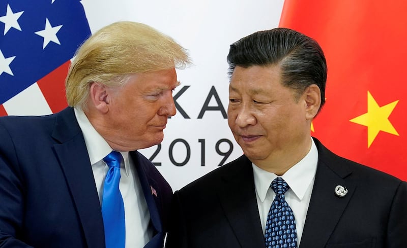 FILE PHOTO: U.S. President Donald Trump meets with China's President Xi Jinping at the start of their bilateral meeting at the G20 leaders summit in Osaka, Japan, June 29, 2019. REUTERS/Kevin Lamarque/File Photo