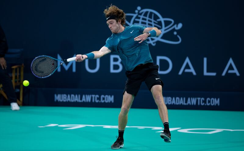 Andrey Rublev hits a forehand to Denis Shapovalov during their semi-final match at the Mubadala World Tennis Championship at Zayed Sports City, Abu Dhabi on Friday, December 17, 2021. Victor Besa / The National