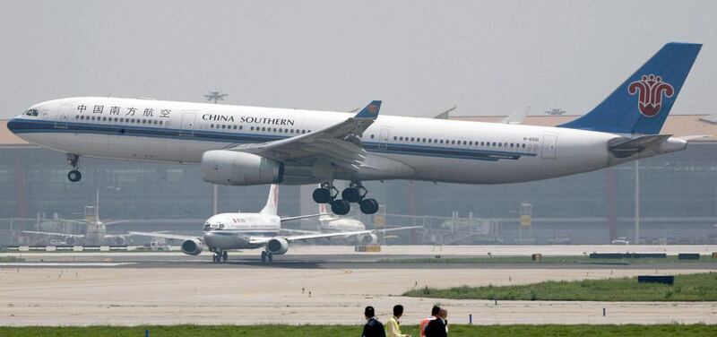 A China Southern Airlines Airbus A330-300 plane lands at Beijing Airport. Despite surging profits, the airline missed forecasts. David Gray / Reuters