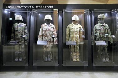 Left to right – Kosovo peacekeeping mission uniform, Restore Hope in Somalia mission uniform , Liberation of Kuwait operation uniform and Lebanon Peacekeeping mission uniform on display at the UAE Armed Forces Exhibition held at Etihad Museum in Dubai. Pawan Singh / The National