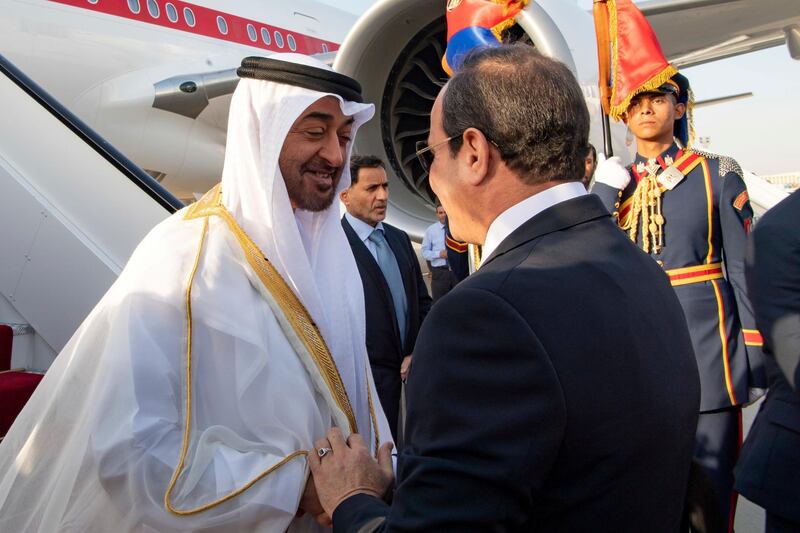 CAIRO, EGYPT - May 15, 2019: HH Sheikh Mohamed bin Zayed Al Nahyan Crown Prince of Abu Dhabi Deputy Supreme Commander of the UAE Armed Forces (L), is received by HE Abdel Fattah El Sisi, President of Egypt (R), upon arrival at Cairo international Airport.

(  Saeed Al Neyadi / Ministry of Presidential Affairs )
---