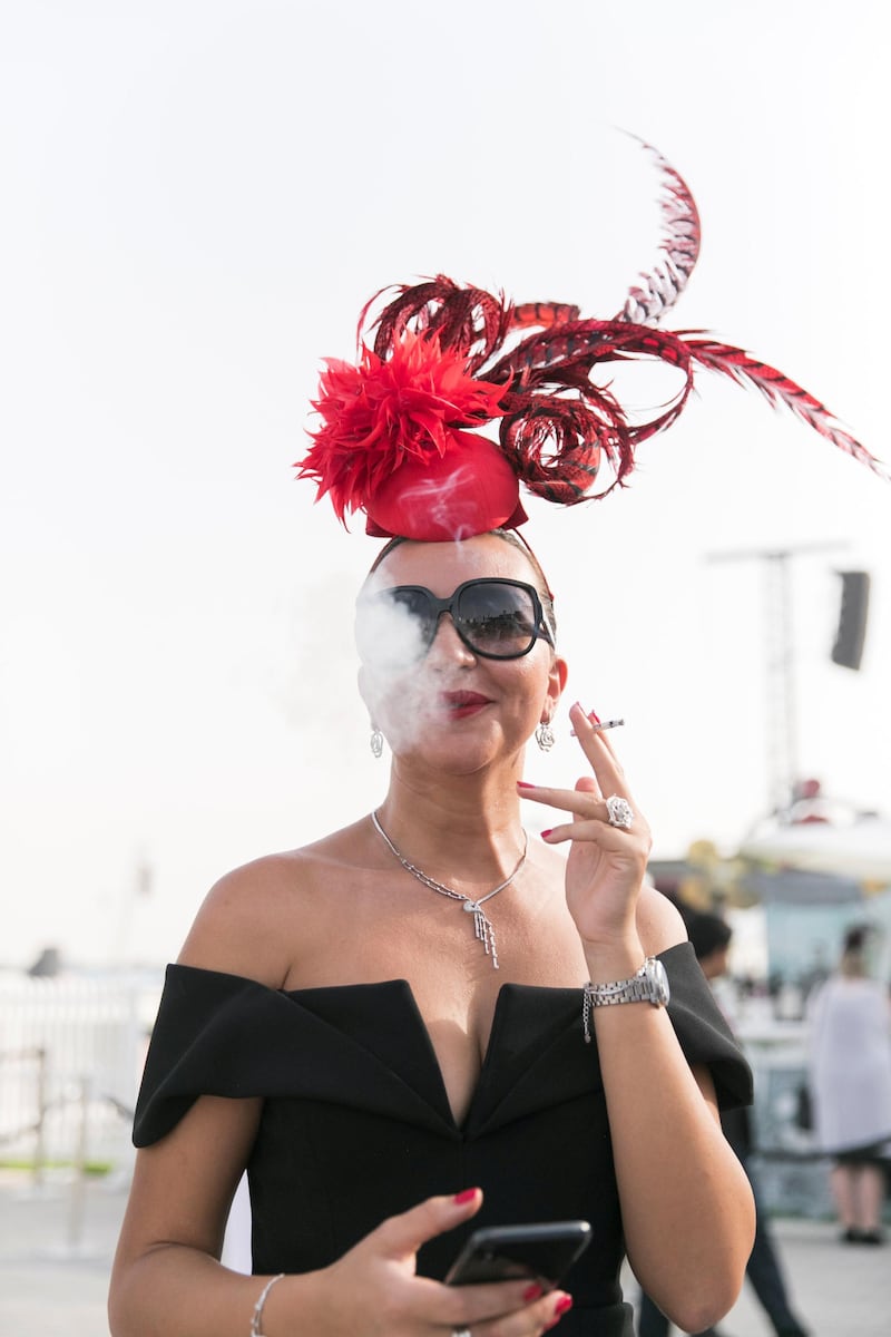 DUBAI, UNITED ARAB EMIRATES - MARCH 31, 2018. 

 Racegoers at Dubai World Cup 2018.

(Photo by Reem Mohammed/The National)

Reporter: 
Section: NA