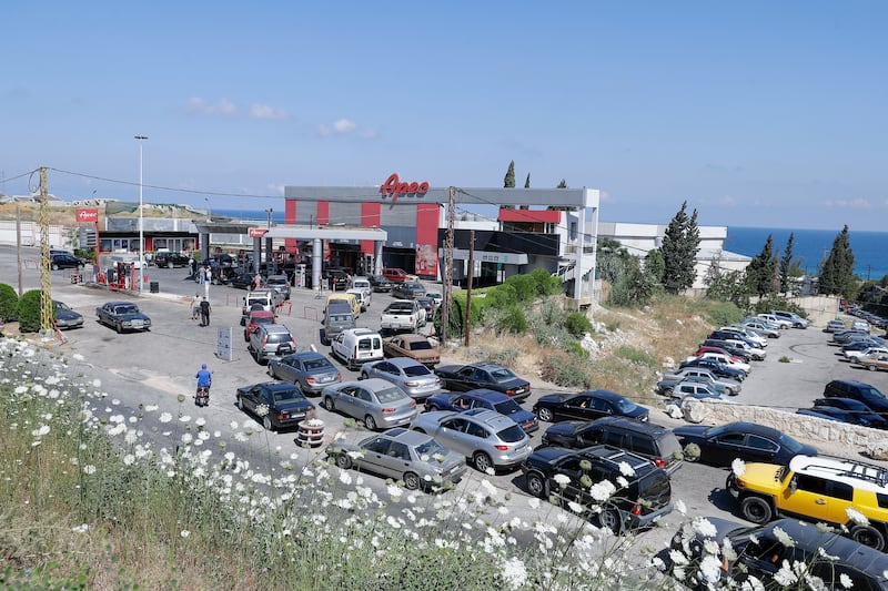 Vehicles queue at a petrol station in the Balamand area on the coastal highway linking Lebanon's capital to the country's north.