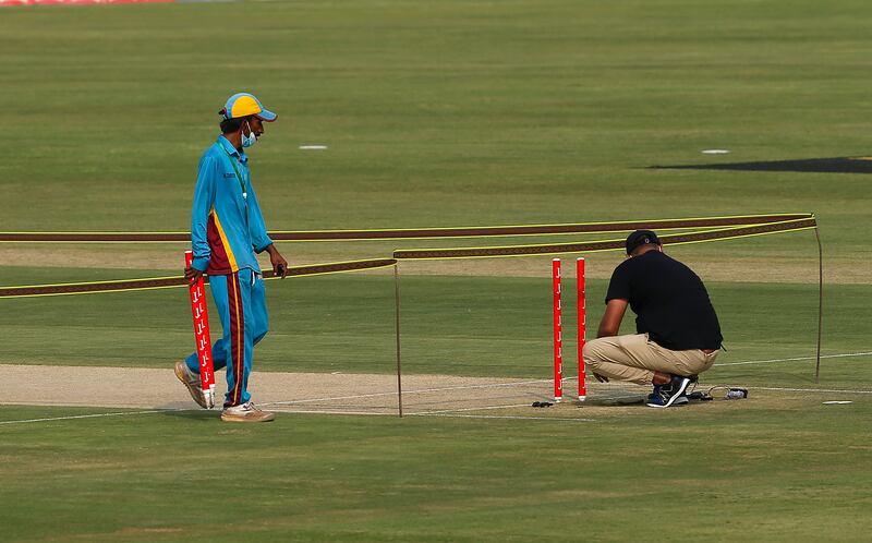Ground staff remove wickets at the Rawalpindi Cricket Stadium after New Zealand pulled out of the Pakistan tour on Friday. AP