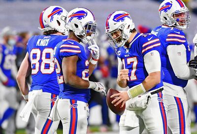 Jan 16, 2021; Orchard Park, New York, USA; Buffalo Bills quarterback Josh Allen (17) celebrates after a play during the second half of an AFC Divisional Round playoff game at Bills Stadium. The Buffalo Bills won 17-3. Mandatory Credit: Rich Barnes-USA TODAY Sports