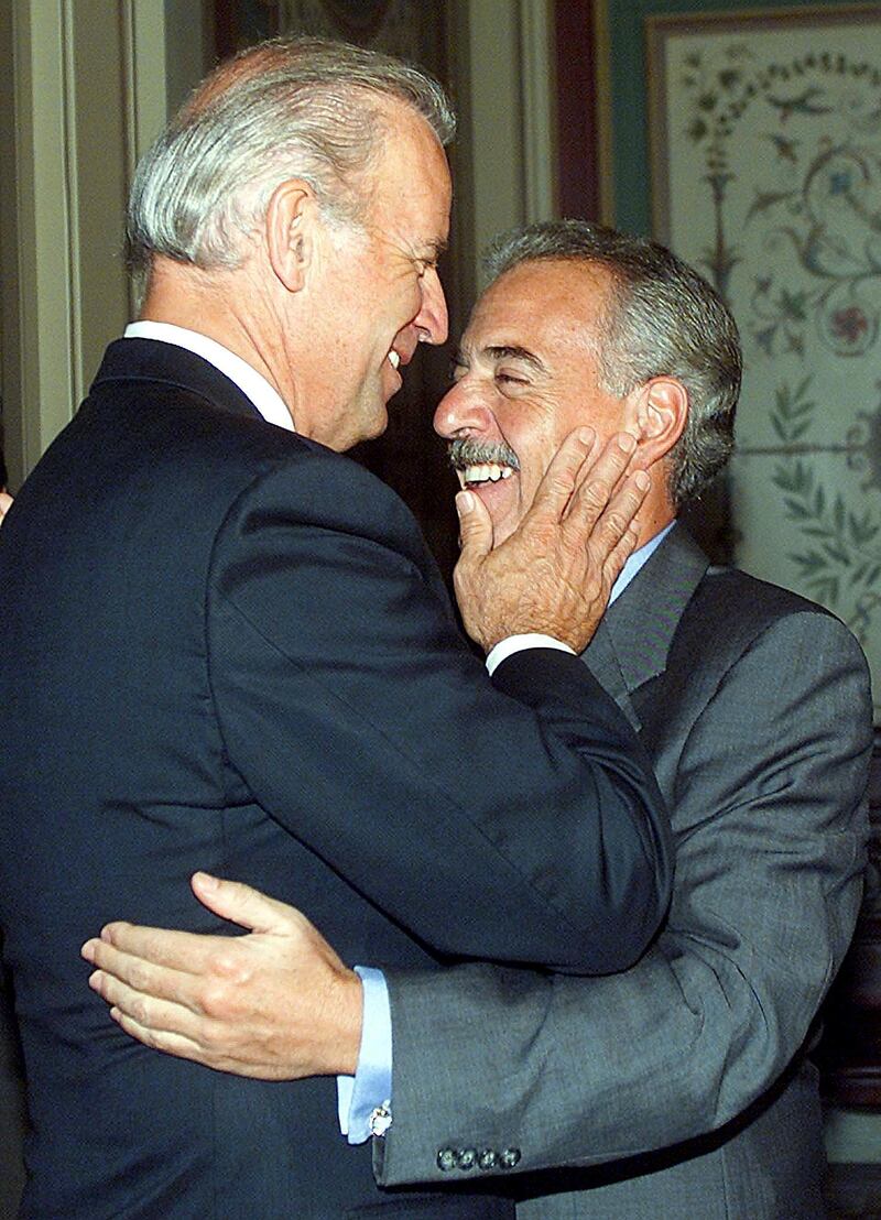 Colombian President Andres Pastrana (R) is greeted 17 April, 2002, by Sen. Joe Biden, D-DE, chairman of the US Senate Foreign Relations Committee at the US Capitol in Washington, DC before Pastrana met with that committee. Pastrana flew to Washington 16 April seeking approval to use US aid for the war on drugs in his country's war against leftist rebels.          AFP PHOTO/Luke FRAZZA (Photo by LUKE FRAZZA / AFP)