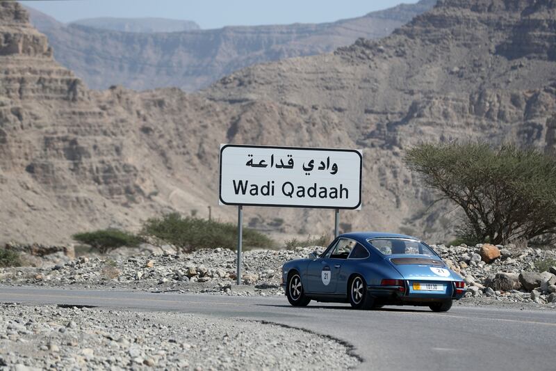 A 1974 Porsche 911 S 2.4 drives through Ras Al Khaimah on the first leg of day 2. 1000 Miglia Experience UAE Prologue. Chris Whiteoak / The National