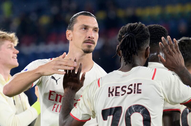 Milan's Zlatan Ibrahimovic celebrates at the end of the Serie A match victory at Roma. EPA