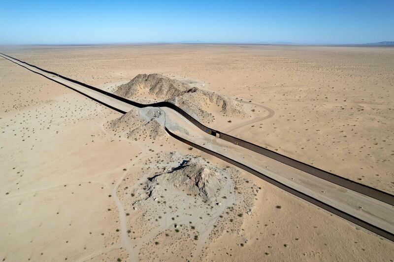 Aerial view of a section of the US-Mexico border wall near San Luis Rio Colorado, Mexico. The wall affects wildlife and environmentalists from both countries are determined to rescue the natural habitat of species whose territories are broken by the controversial structure. AFP