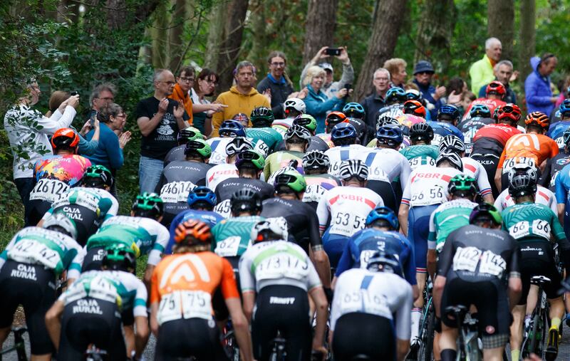 The peloton climb a hill at Stow in Scotland during Stage 7 of the Tour of Britain on Saturday September 11. PA