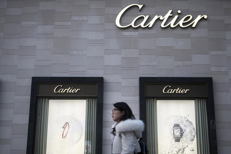 A pedestrian walks past a Cartier Ltd. store, operated by Cie. Financiere Richemont SA, in the Wangfujing shopping area of Beijing, China, on Saturday, Jan. 12, 2019. The luxury-goods industry’s fate is closely linked to the perceived strength of demand from affluent Chinese consumers. Most analysts expect the economy to cool amid a trade spat with the U.S. Photographer: Giulia Marchi/Bloomberg