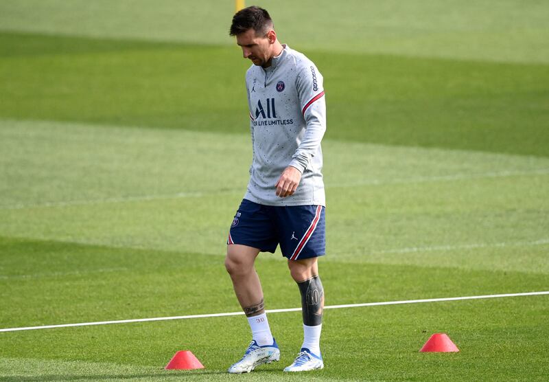 Paris Saint-Germain's Argentinian forward Lionel Messi takes part a training session at the Camp des Loges Paris Saint-Germain football club's training ground in Saint-Germain-en-Laye on May 7, 2022.  (Photo by FRANCK FIFE  /  AFP)