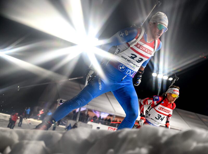 Greece's Apostolos Angelis (L) and Austria's Felix Leitner compete during the men's 20 km individual event of the IBU Biathlon World Championships in Nove Mesto, Czech Republic on February 14, 2024.  (Photo by Joe Klamar  /  AFP)