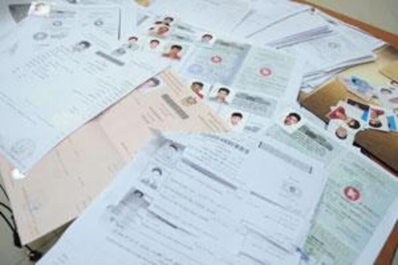 Visas confiscated by police in Ras al Khaimah.