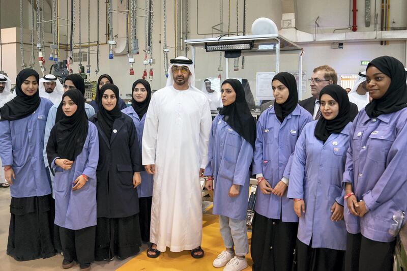 AL AIN, ABU DHABI, UNITED ARAB EMIRATES - February 7, 2019: HH Sheikh Mohamed bin Zayed Al Nahyan, Crown Prince of Abu Dhabi and Deputy Supreme Commander of the UAE Armed Forces (C), stands for a photograph with students while visiting UAE University in Al Ain. 
( Ryan Carter / Ministry of Presidential Affairs )
---