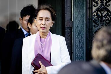 epa08064831 Myanmar State Counselor Aung San Suu Kyi (C) departs on the last day of the genocide case against Myanmar at the Peace Palace in The Hague, The Netherlands, 12 December 2019. Myanmar State Counselor Aung San Suu Kyi defended her country at the International Court of Justice against accusations of genocide filed by The Gambia, following the 2017 Myanmar military crackdown on the Rohingya Muslim minority. EPA/SEM VAN DER WAL