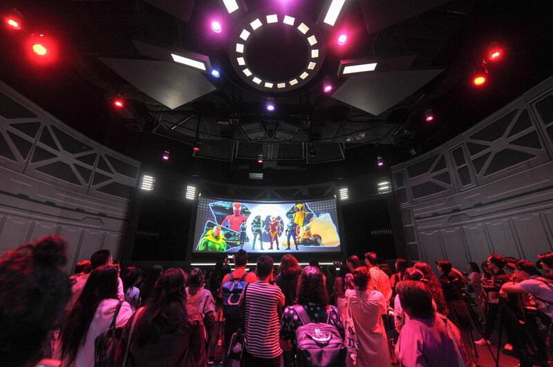 Visitors watch introduction of Marvel fictional superheroes at the Marvel Experience Thailand themed entertainment attraction in Bangkok, Thailand, 27 June 2018. The much-anticipated themed entertainment attraction The Marvel Experience Thailand will finally be open to the public from tomorrow (29 Jun). Los Angeles-based Hero Ventures and Hero Experience are teaming up to bring The Marvel Experience to Thailand, its first themed entertainment attraction to launch in South East Asia. The Marvel Experience offers fans a unique and mind-blowing family entertainment experience with the latest in state-of-the-art interactive and multimedia technology set inside a custom-made domed venue. The project is currently under construction and is expected to open in the first half of 2018, The 10,000sqm venue in the Bang Na area will allow visitors to be a part of the action through a first-of-its kind interactive adventure featuring such well-known Marvel characters as Spider-Man, Iron Man, Hulk, Thor, Black Widow, Wolverine and Captain America.  (Imaginechina via AP Images)