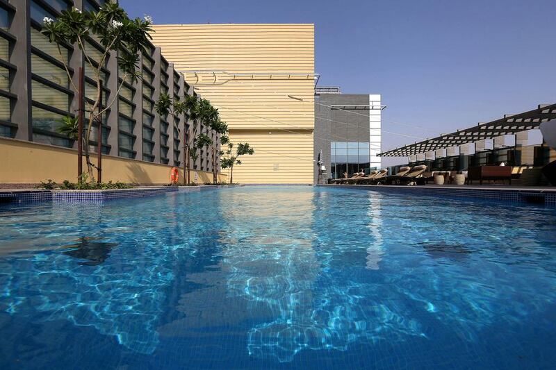 Guests can enjoy the outdoor swimming pool at the Southern Sun hotel. Pawan Singh / The National