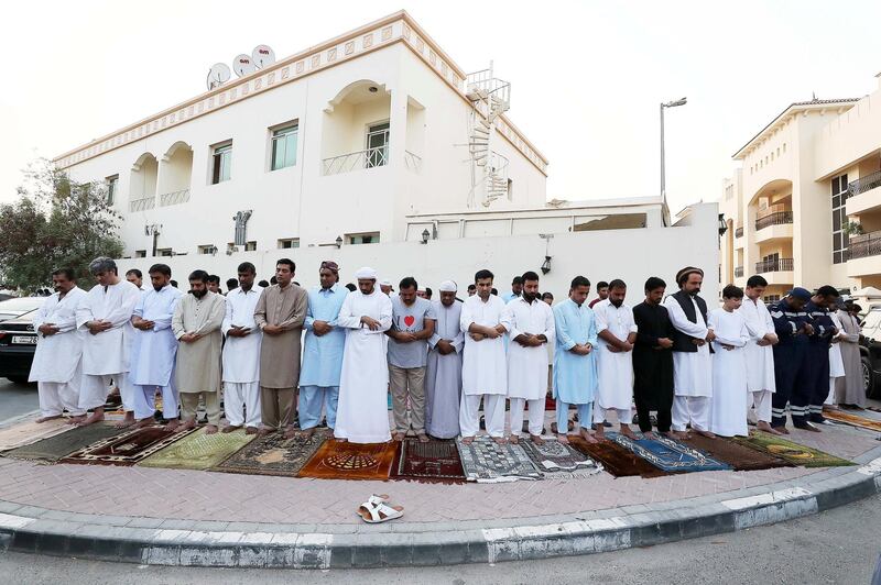 DUBAI, UNITED ARAB EMIRATES, August 21 – 2018 :- People during the Eid Al Adha prayers near the Jumeirah Mosque in Dubai. ( Pawan Singh / The National )  For News. Story by Nawal