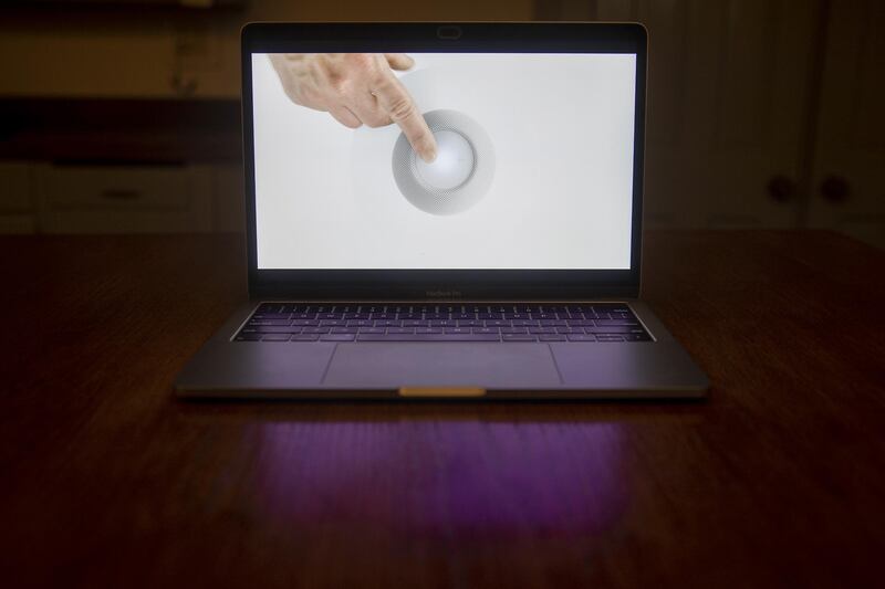 Apple HomePod mini speaker is unveiled during a virtual product launch seen on a laptop computer in Tiskilwa, Illinois, U.S.  Bloomberg