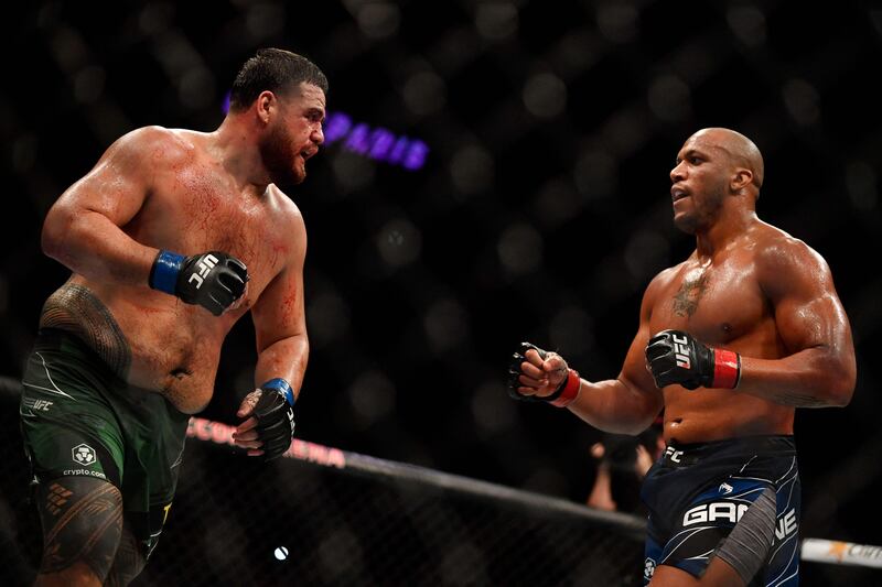 Ciryl Gane and Tai Tuivasa compete in their heavyweight fight. AFP