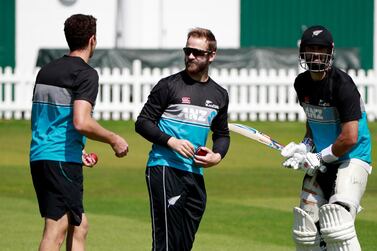 New Zealand captain Kane Williamson, centre, talks with teammate's Mitchell Santner, left, and Daryl Mitchell during a practice session at Lord's Cricket Ground in London, Monday, May 31, 2021.New Zealand will play England in the first of two tests here starting June 2. (AP Photo/Ian Walton/Pool)