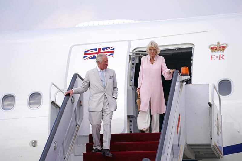 The Prince of Wales and his wife arrive at Cairo airport in Egypt from Jordan, on the third day of their tour of the Middle East.