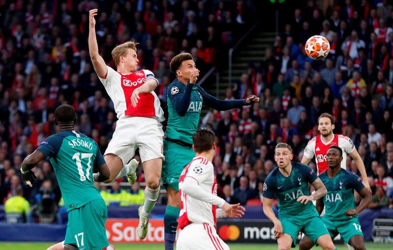 Ajax's Matthijs de Ligt scores their first goal with a header. Reuters