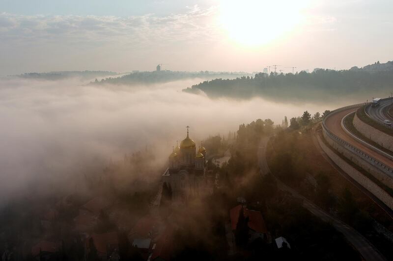 Early morning fog rolls over the Cathedral of All Russian Saints in the grounds of the Russian Orthodox Gorny Convent in Ein Kerem, Jerusalem. Reuters