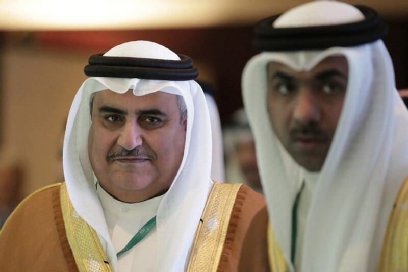 Bahraini foreign minister Sheikh Khalid bin Ahmed Al Khalifa, left, at the Manama Dialogue in 2015. Hasan Jamali / AP Photo