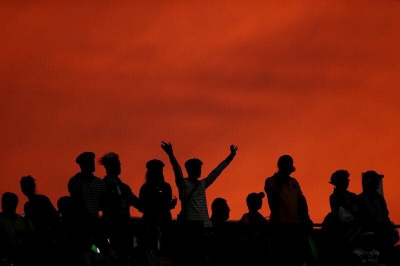 Fans cheer during the Rugby World Cup quarter-final between Wales and France at Oita Stadium, Oita, Japan  Reuters