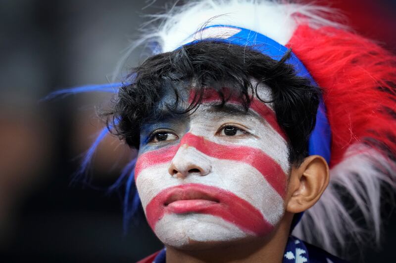 Face painting is always popular among US football fans. AP