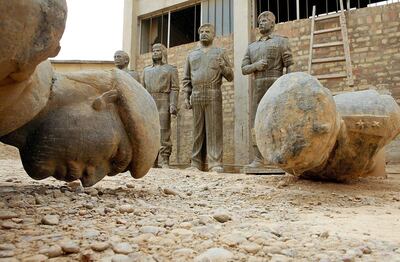 Statues and busts of former dictator Saddam Hussein in a factory in Baghdad in April 2003. EPA
