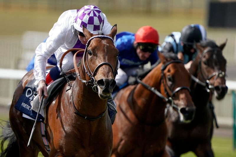 Kevin Manning rides Poetic Flare to victory at the 2000 Guineas Stakes at Newmarket on Saturday. Getty