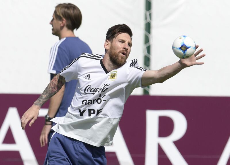 Argentina's Lionel Messi stops a mini ball during a training session at the team's base camp in Bronnitsy, on June 25. Juan Mabromata / AFP