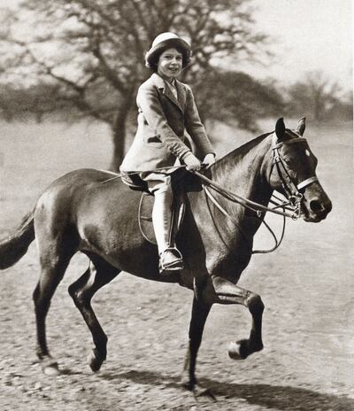 Princess Elizabeth, aged 9, rides a pony. Getty Images