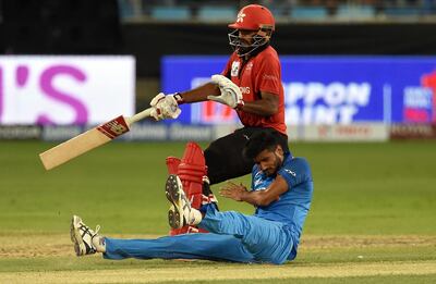 Indian cricketer Khaleel Ahmed appeals successfully for the wicket of Hong Kong batsman Nizakat Khan (L) during the one day international (ODI) Asia Cup cricket match between Bangladesh and Sri Lanka at The Dubai International Cricket Stadium in Dubai on September 15, 2018. / AFP / ISHARA S.  KODIKARA
