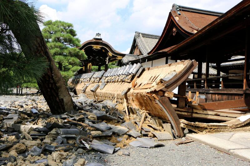 A wall of Minami Noh Butai of Nishi Honganji temple, a world heritage site, is damaged by a powerful typhoon in Kyoto, western Japan. AP Photo