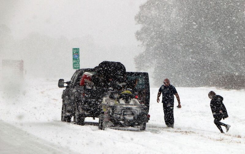 Motorists in America's southern states are not used to snowy driving conditions. Robert Ray / AP Photo