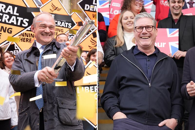 Liberal Democrat leader Ed Davey and Labour leader Keir Starmer could need each other in Britain's coming general election. PA