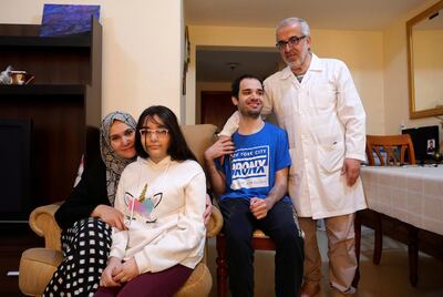 AJMAN, UNITED ARAB EMIRATES , March 14, 2021 – Jamal Abu Labam with his wife Manal Tamim , daughter Sama Abu Laban and son Almotaz bella Abu Laban
 from Syria at his apartment in Ajman. (Pawan Singh / The National) For News/Online/Instagram. Story by Haneen
