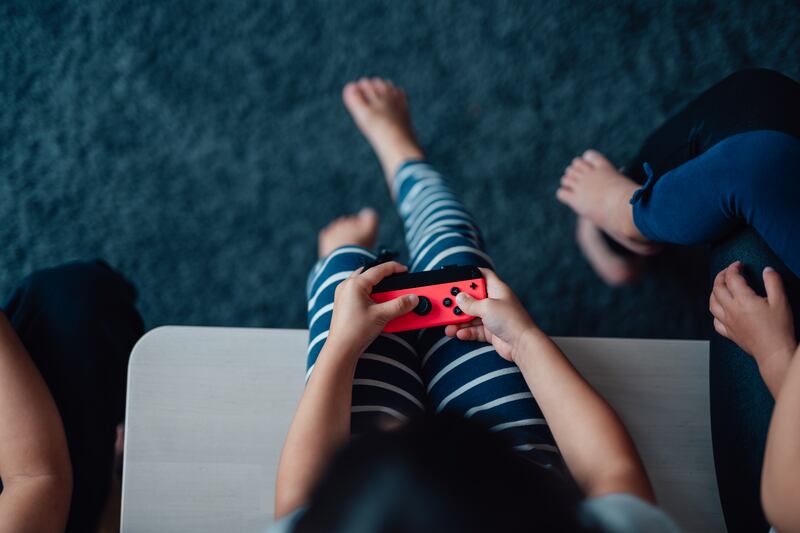 Child development experts have advised parents on what to look out for when identifying the early signs of gaming addiction in children. Getty Images