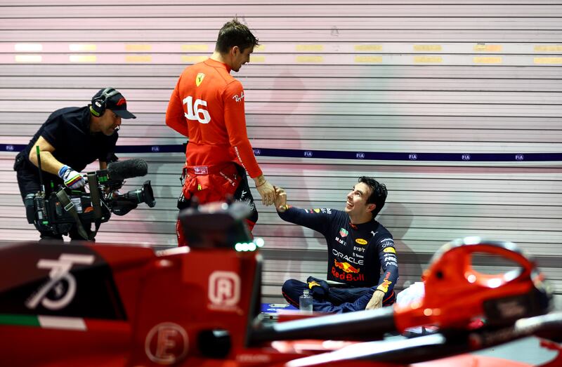 Race winner Sergio Perez  and second placed Charles Leclerc celebrate in parc ferme. Getty