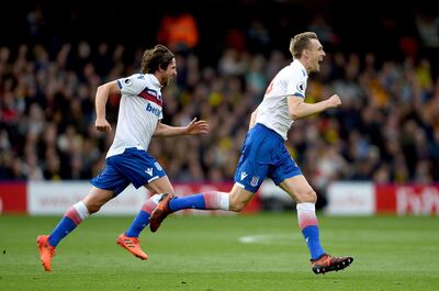 Stoke City's Darren Fletcher, right, celebrates scoring his side's first goal of the game against Watford during their English Premier League soccer match at Vicarage Road in Watford, England, Saturday Oct. 28, 2017.  (Daniel Hambury/PA via AP)