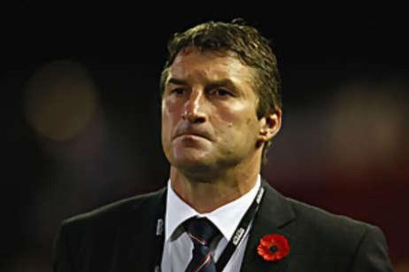 The England coach Tony Smith looks dejected after losing the match against New Zealand at EnergyAustralia Stadium.